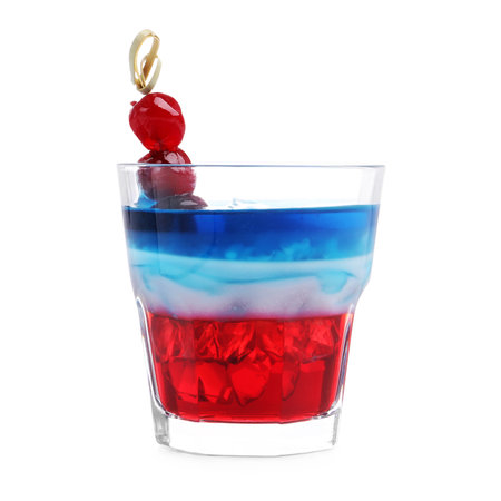Layered cocktail in colors of American flag with ice and cherries isolated on whiteの写真素材