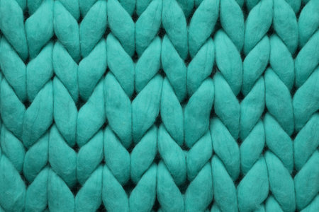 Turquoise knitted wool texture as background, top viewの写真素材