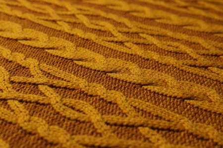 Orange knitted wool texture as background, closeupの写真素材