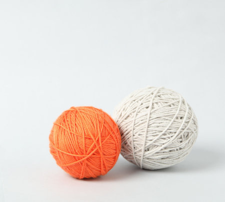 Soft colorful woolen yarns on white background. Space for textの写真素材