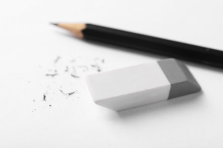 Eraser, pencil and scraps on paper, closeupの写真素材
