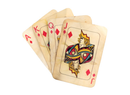 Old vintage playing cards isolated on white