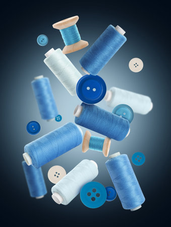 Many sewing threads in different shades of blue flying on dark gradient background