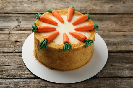 Delicious homemade carrot cake on wooden tableの写真素材