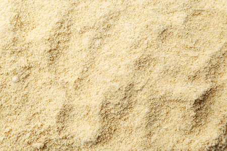 Superfood product. Sesame seeds powder as background, closeupの写真素材