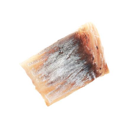Piece of delicious herring isolated on whiteの写真素材