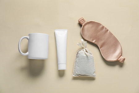 Different blank items on beige background, flat lay. Mockup for designの写真素材