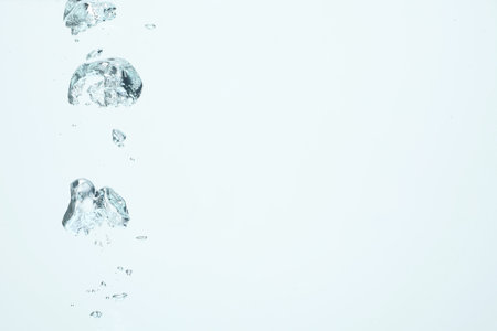 Many water bubbles on light background, closeup.の写真素材