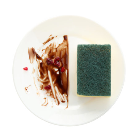 Dirty plate and sponge isolated on white, top viewの写真素材