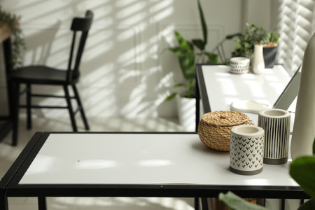 Console table with different decor and chair indoors, closeup. Interior designの写真素材