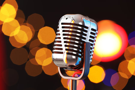 One vintage microphone against dark background, closeup. Bokeh effectの写真素材