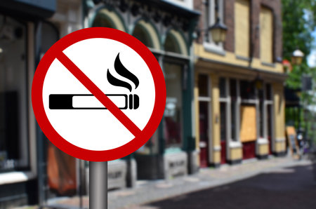 No Smoking sign on city street.の写真素材