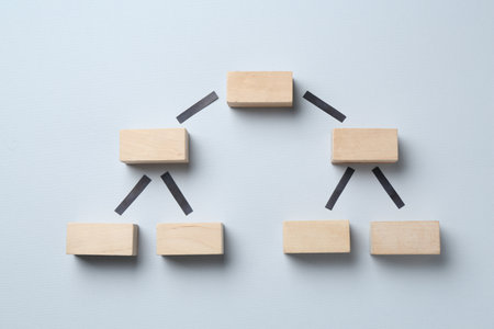 Family tree made with wooden blocks on light grey background, top viewの写真素材