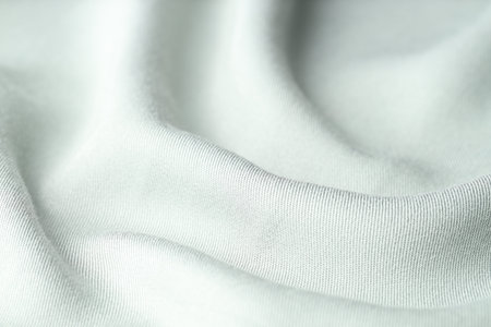 Texture of white fabric as background, closeup