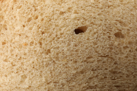 Freshly baked bread as background, closeup viewの写真素材
