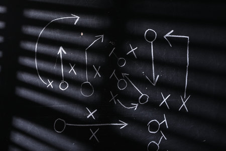 Chalkboard with scheme of American football game as background, closeupの写真素材