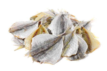 Dried cod fish fillets isolated on whiteの写真素材