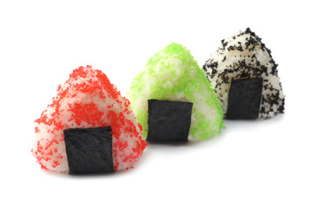 Tasty tobiko onigiri (Japanese rice balls) isolated on whiteの写真素材