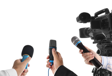 Journalists with microphones and video camera on white background, closeupの写真素材