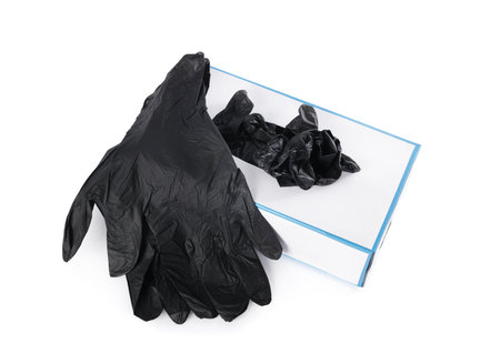 Black medical gloves and box isolated on white, above viewの写真素材