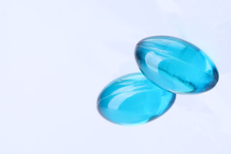 Collagen capsules on white background, above view. Space for textの写真素材