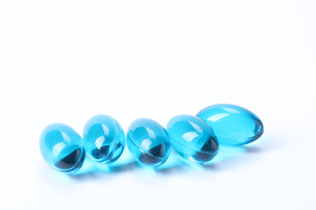 Collagen capsules isolated on white. Dietary supplementの写真素材