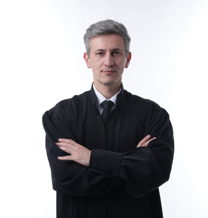 Judge with crossed arms on white backgroundの写真素材