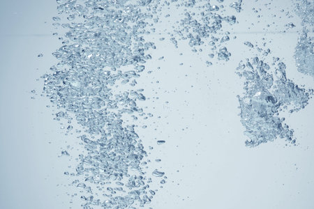Soda water with bubbles as background, closeup