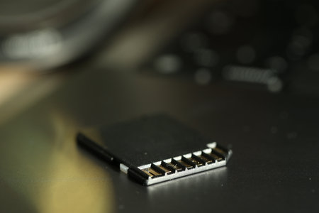 One SD memory card on laptop, closeupの写真素材