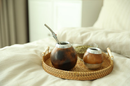 Traditional yerba mate tea on bed indoorsの写真素材