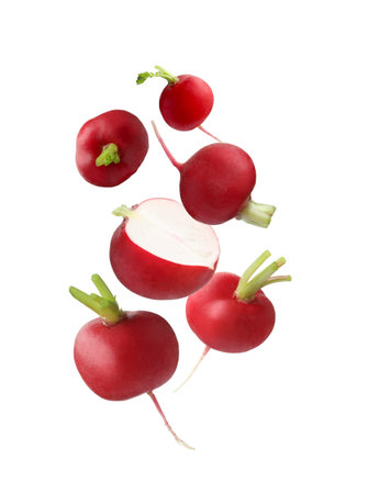 Fresh ripe radishes falling on white backgroundの写真素材