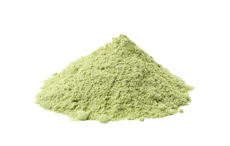 Superfood. Pile of wheat grass powder isolated on whiteの写真素材