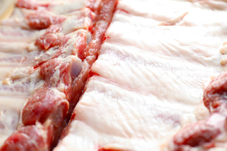 Fresh raw pork ribs as background, closeupの写真素材