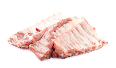 Fresh raw pork ribs isolated on whiteの写真素材