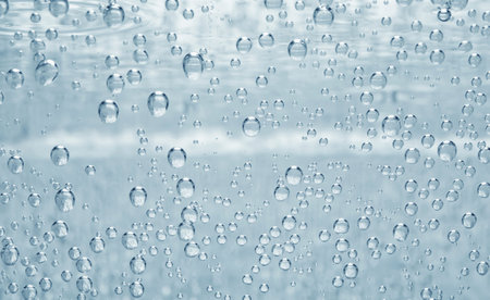Soda water with bubbles as background, closeup