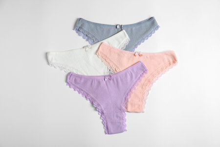 Women's underwear. Beautiful panties on white background, flat layの写真素材