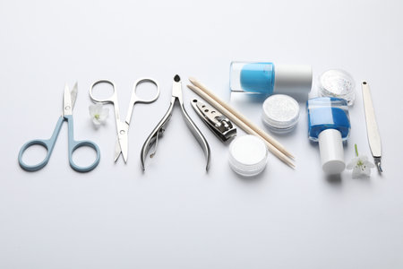 Set of different manicure tools on white backgroundの写真素材