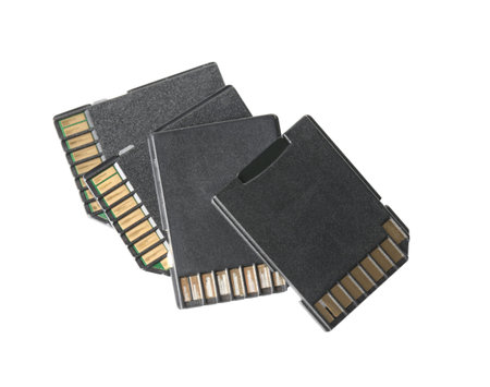 Many SD memory cards isolated on white, top view