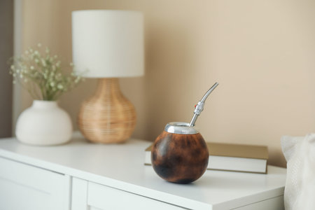 Traditional yerba mate tea on nightstand indoorsの写真素材