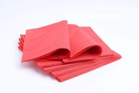 Many red paper handkerchiefs isolated on whiteの写真素材