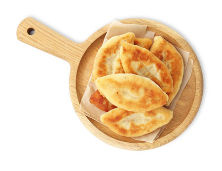 Delicious fried pyrizhky (stuffed pies) isolated on white, top viewの写真素材