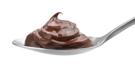 Tasty chocolate pudding in spoon isolated on whiteの写真素材