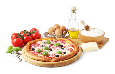 Tasty pizza and ingredients isolated on whiteの写真素材