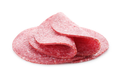 Slices of tasty smoked sausage isolated on whiteの写真素材