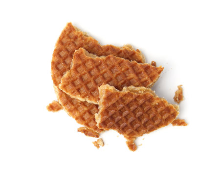 Pieces of tasty waffle isolated on white, top viewの写真素材