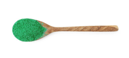 Light green powder on wooden spoon, top viewの写真素材