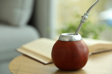 Traditional yerba mate tea on wooden table indoors, closeupの写真素材