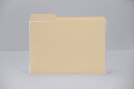 One paper file folder on gray background