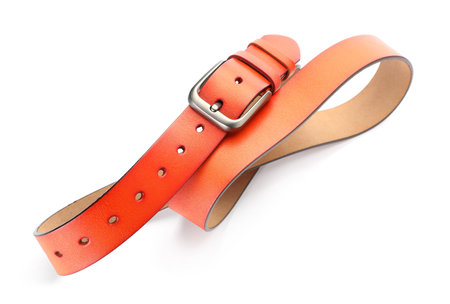 One orange leather belt isolated on whiteの写真素材