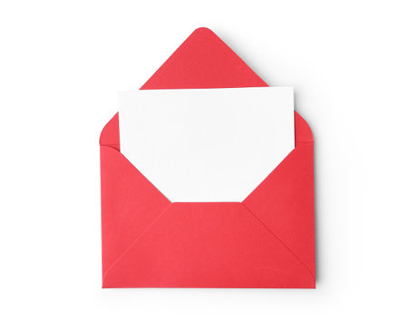 Blank greeting card in red paper envelope on white background, top viewの写真素材